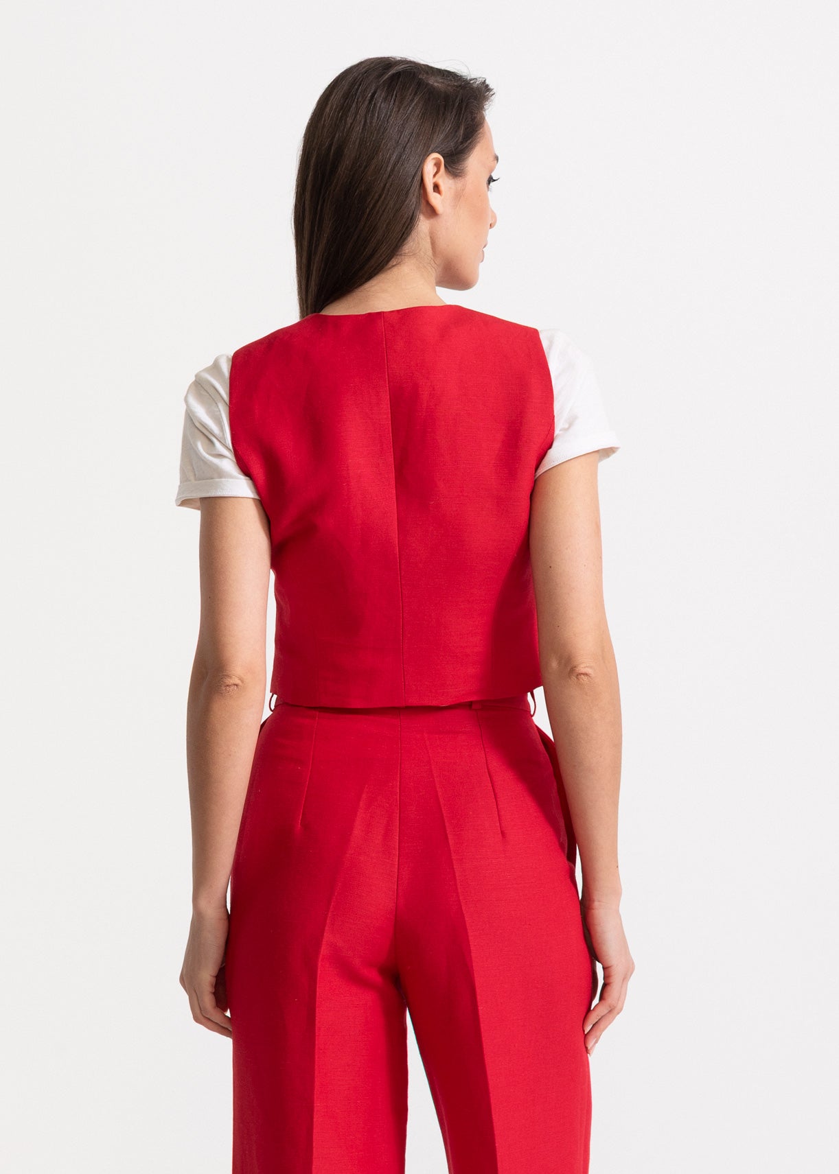 Back view of red linen waistcoat tailored detail