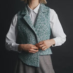 Teal wool tweed vest side profile tailored layer